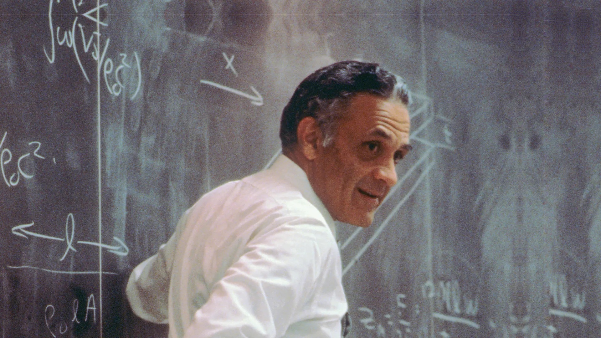 Dr. Amar Bose at a chalkboard